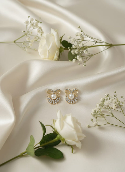 Faagun Pearl Bow Studs